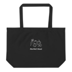 Minimalist "Market Haul" vegetable embroidery including a carrot, tomato, onion, pepper, and broccoli on a natural beige organic cotton tote bag. High-quality stitching detail on 8oz heavyweight fabric.