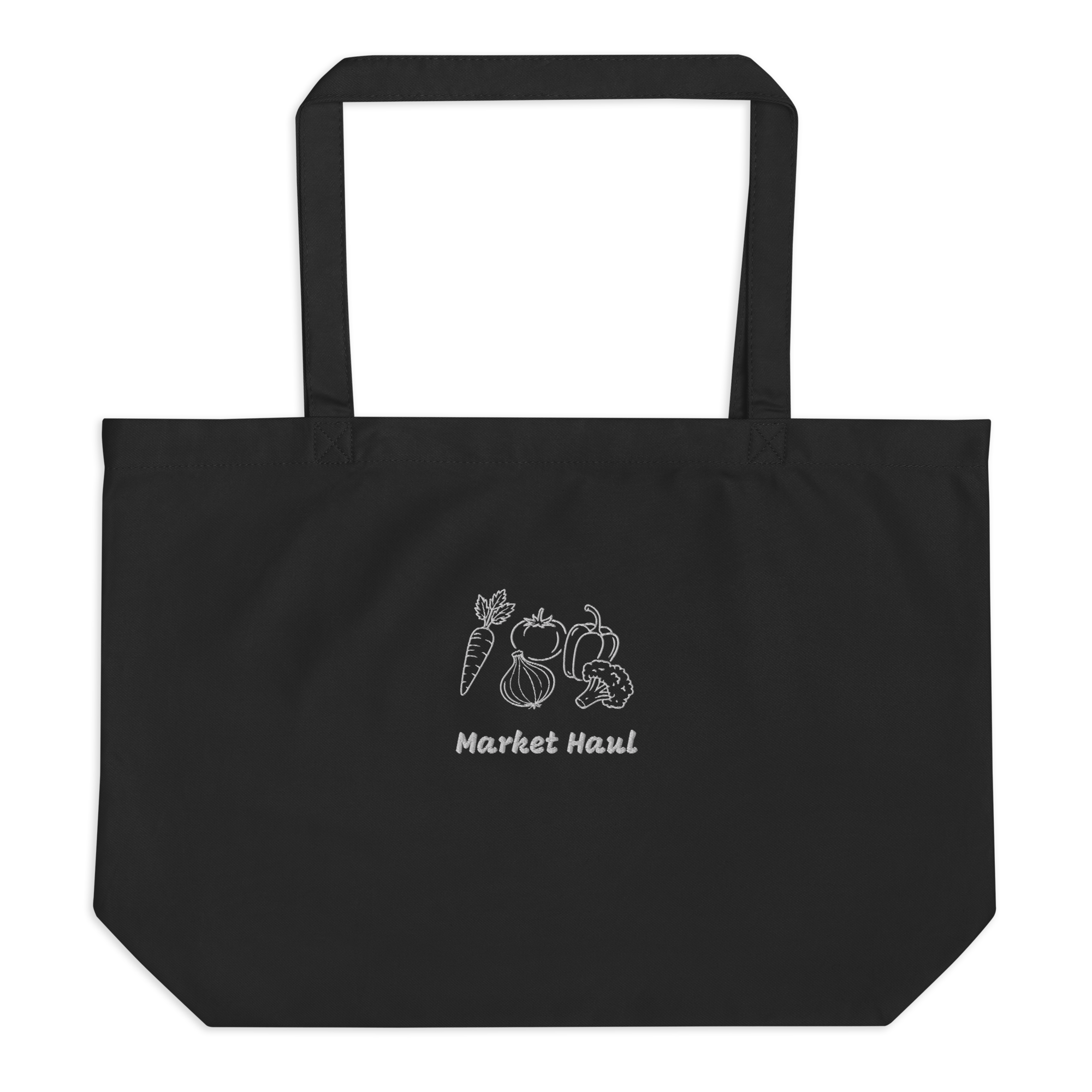 Minimalist "Market Haul" vegetable embroidery including a carrot, tomato, onion, pepper, and broccoli on a natural beige organic cotton tote bag. High-quality stitching detail on 8oz heavyweight fabric.
